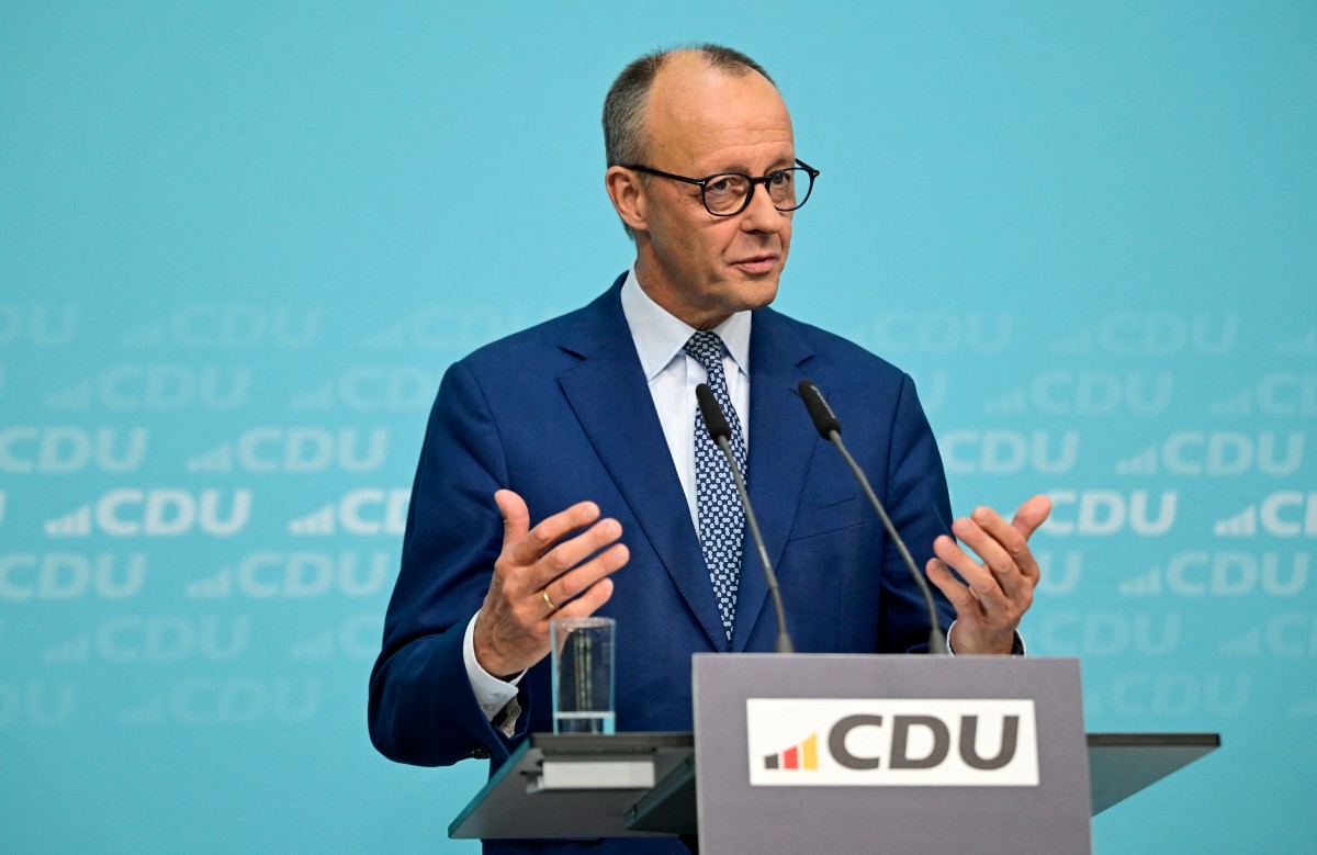 German Chancellor Friedrich Merz addresses journalists on October 20, 2025 at his conservative Christian Democratic Union's (CDU) party headquarters in Berlin, Germany.