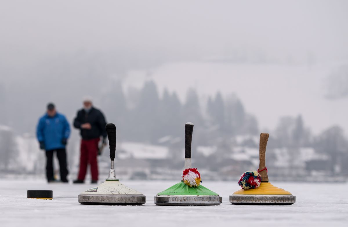 On January 24, 2017, day trippers play ice stock sport on the frozen Schliersee lake in Schliersee (Bavaria).