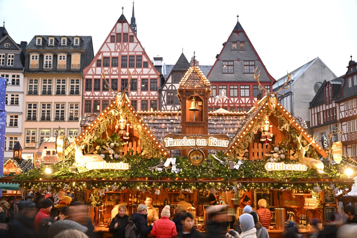 Frankfurt's Christmas market is seen lit up.