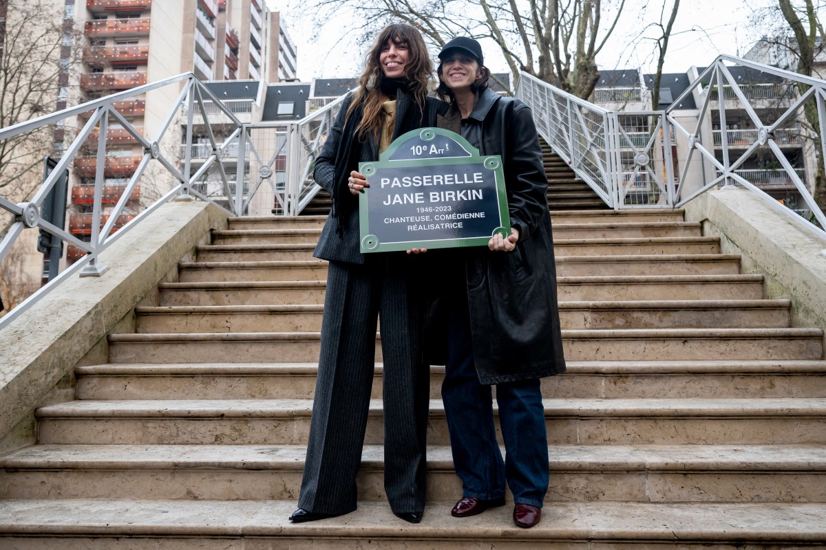 indicating the "Passerelle Jane Birkin" during a ceremony inaugurating a footbridge named after British-French actress and singer Jane Birkin, Quai de Valmy in Paris