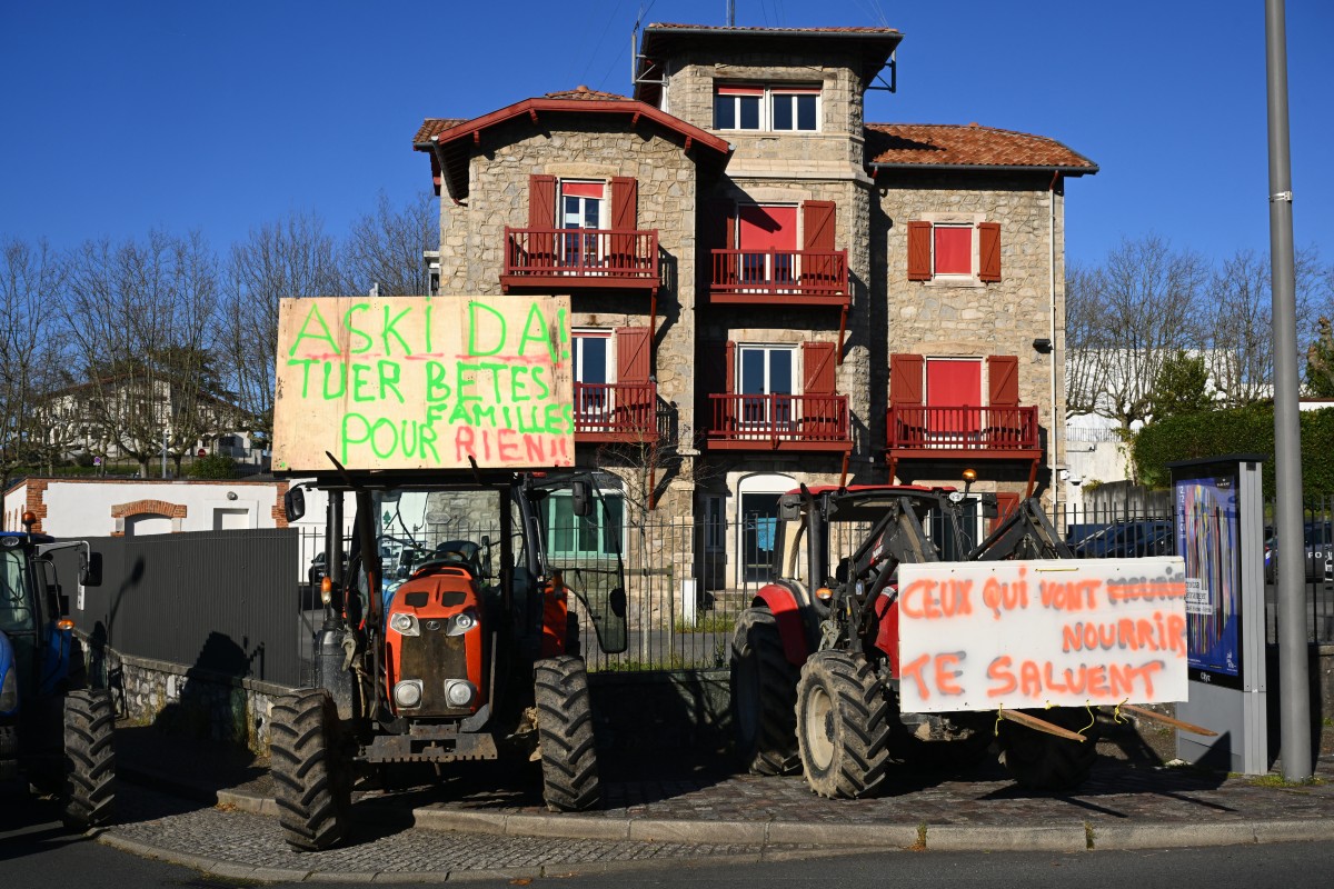 Tractors block a roundabout during a protest called by French farmers unions Coordination Rurale and ELB (Euskal Herriko Laborarien Batasuna) in Saint-Jean de Luz southwestern France