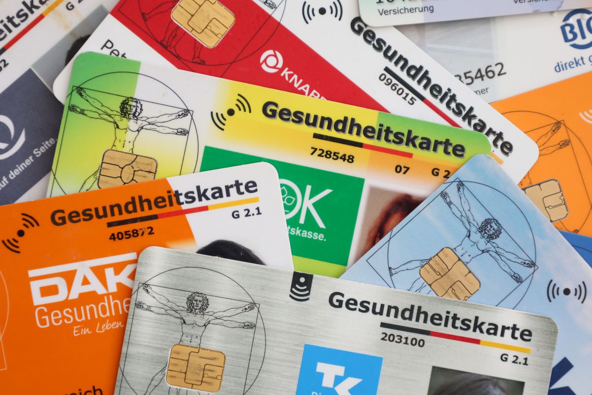 A selection of health insurance cards from statutory health insurance companies in Germany.