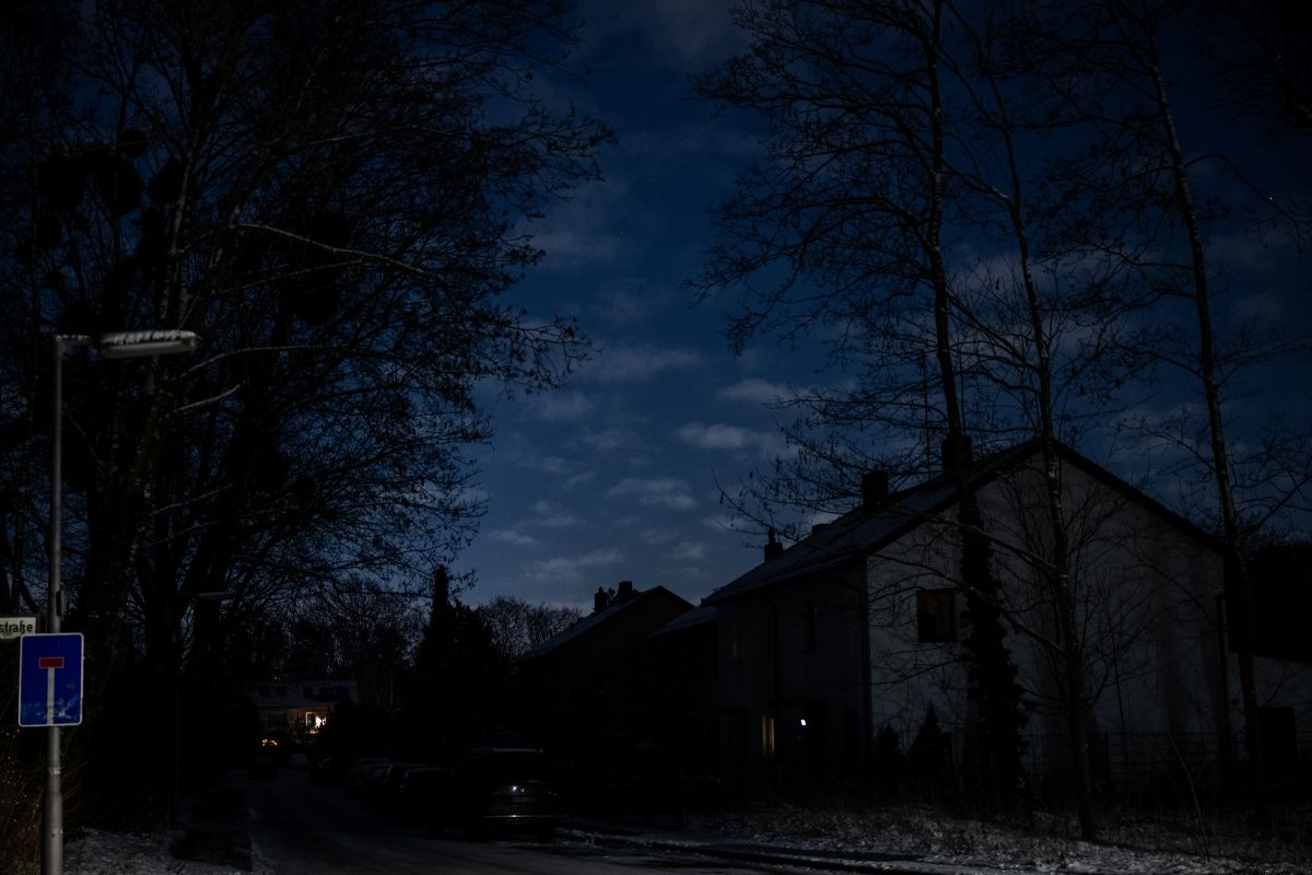 A suburban street in Berli is dark with no power to the houses.