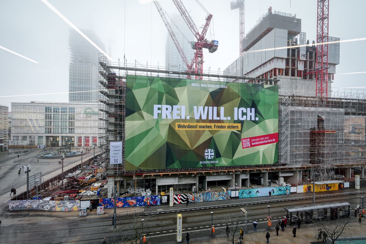 The German Armed Forces advertises the new military service arrangements with huge posters on Alexanderplatz