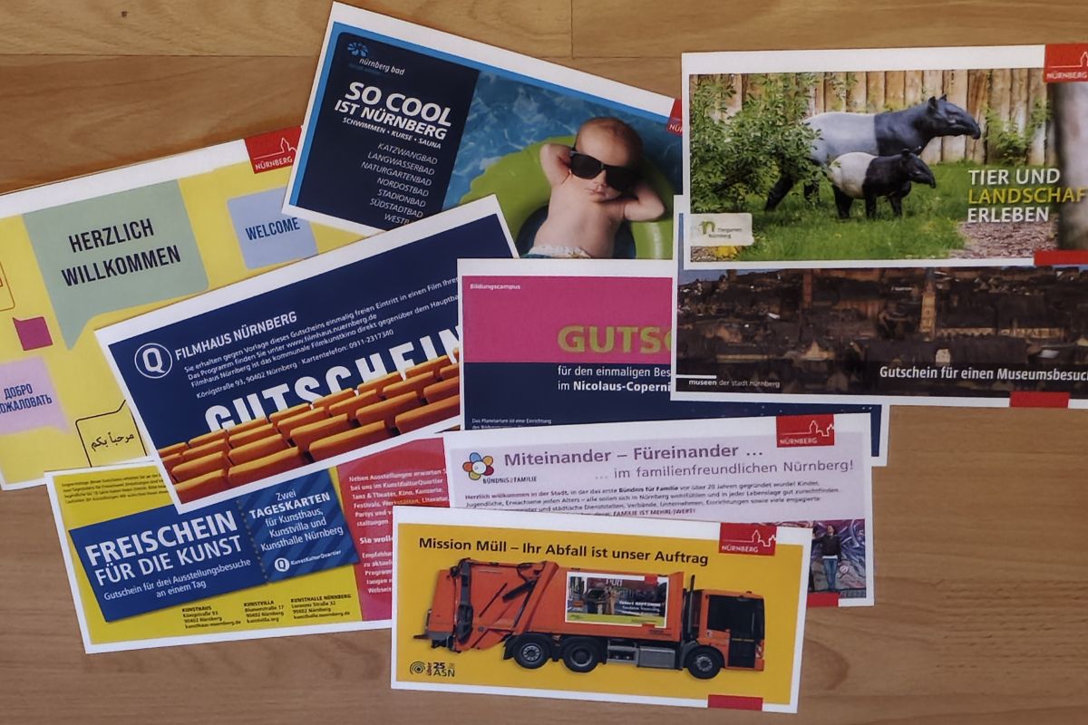 A collection of colourful vouchers are strewn across the floor.