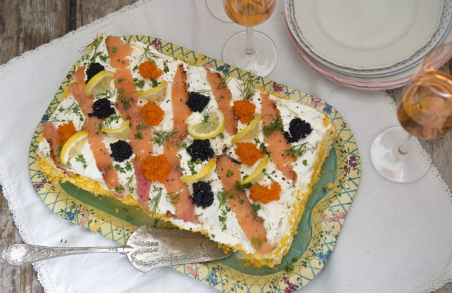 Smörgåstårta, a savoury cake made of bread with various sandwich fillings. 