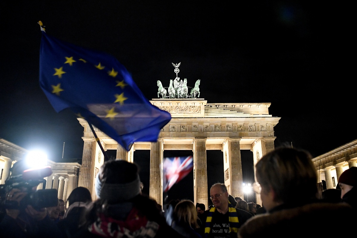 People gather at Berlin's Brandenburg Gate no the eve of Brexit. 