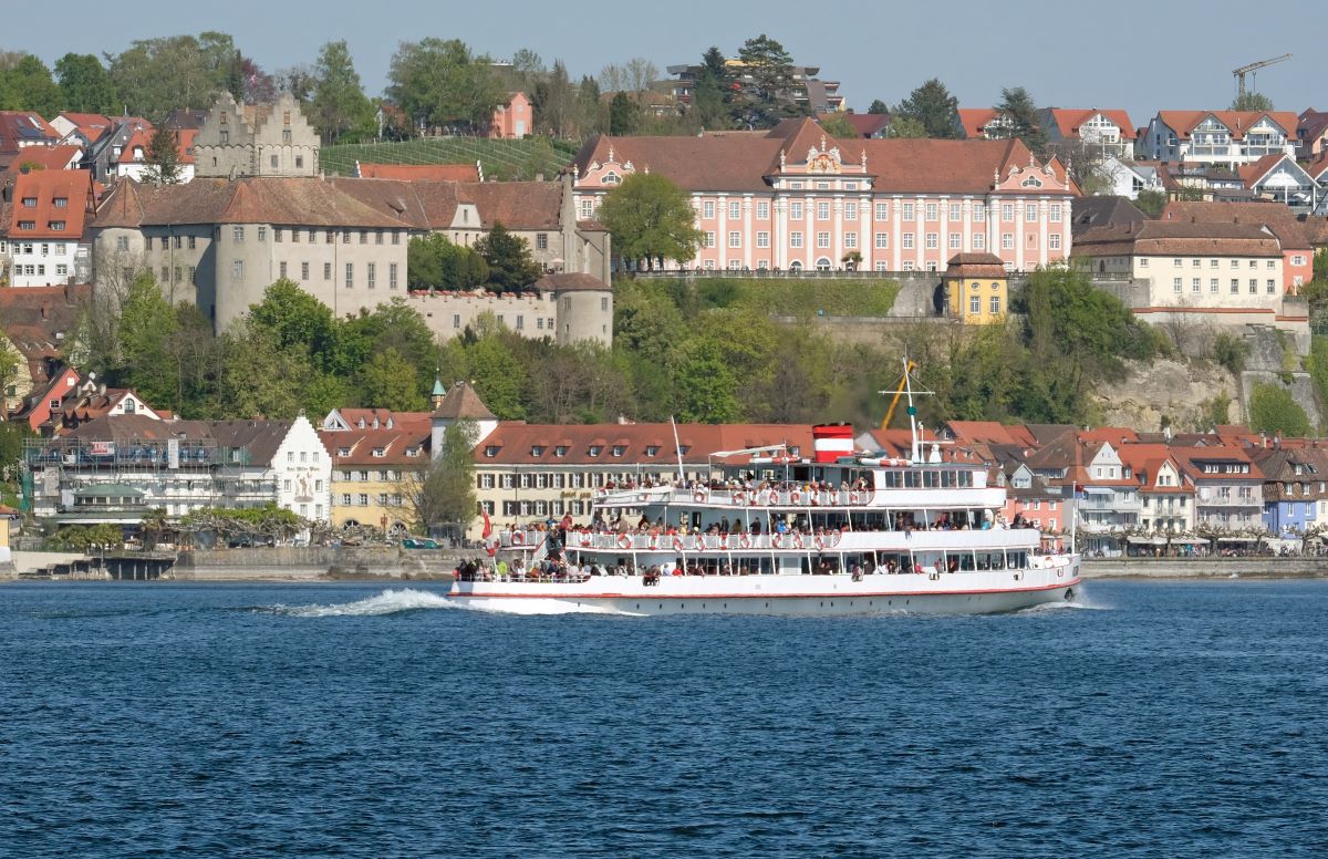A tourist boat sails past Meersburg on Lake Constance.