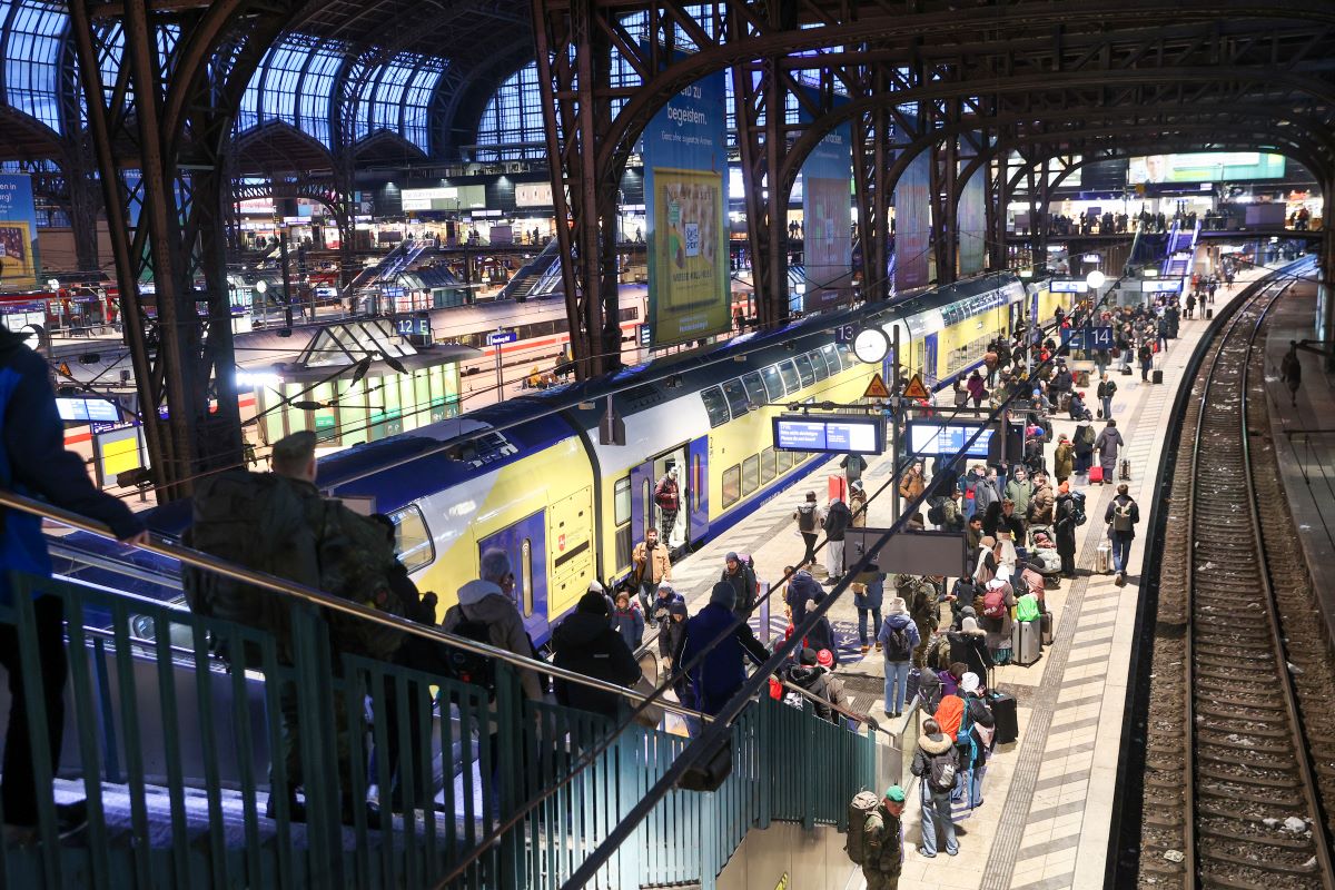 A regional train is ready to depart from Hamburg main station in the afternoon.