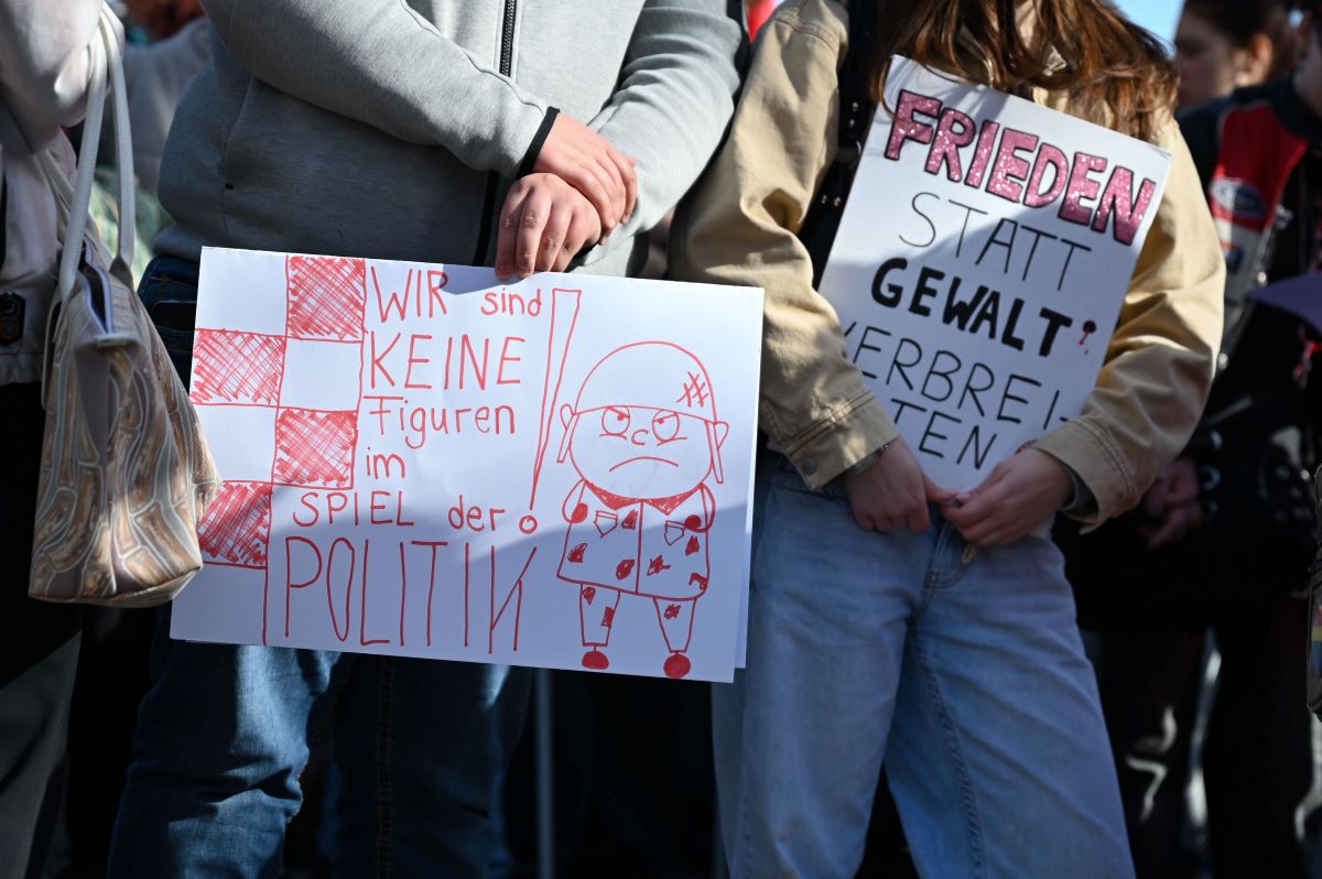 Participants demonstrate against new military service on Schlossplatz in Stuttgart. 