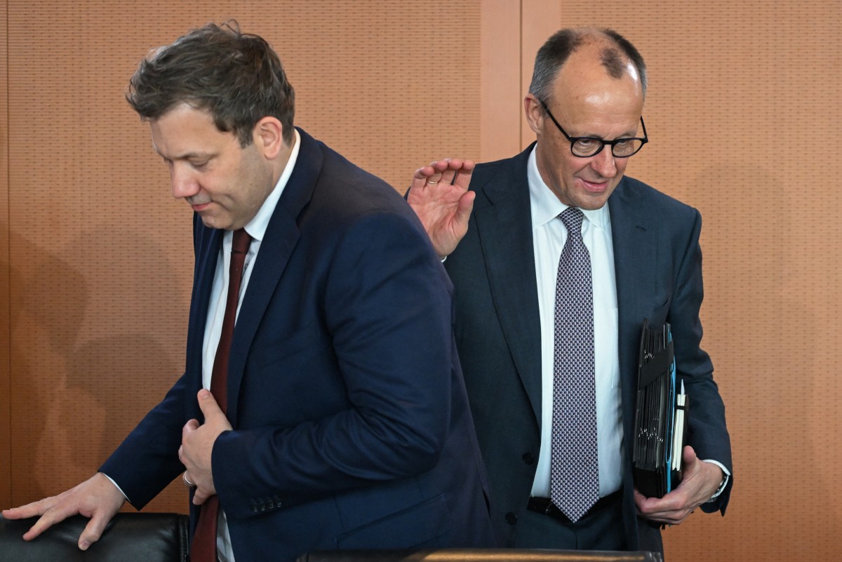 German Chancellor Friedrich Merz and German Finance Minister and Vice-Chancellor Lars Klingbeil take their seats prior to the weekly cabinet meeting, on March 11, 2026 at the Chancellery in Berlin. 