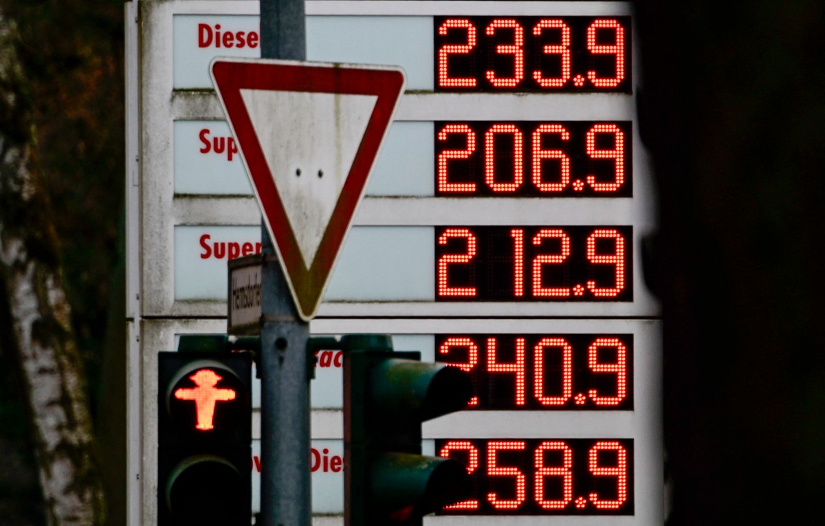 Fuel prices are displayed on a board in Berlin.