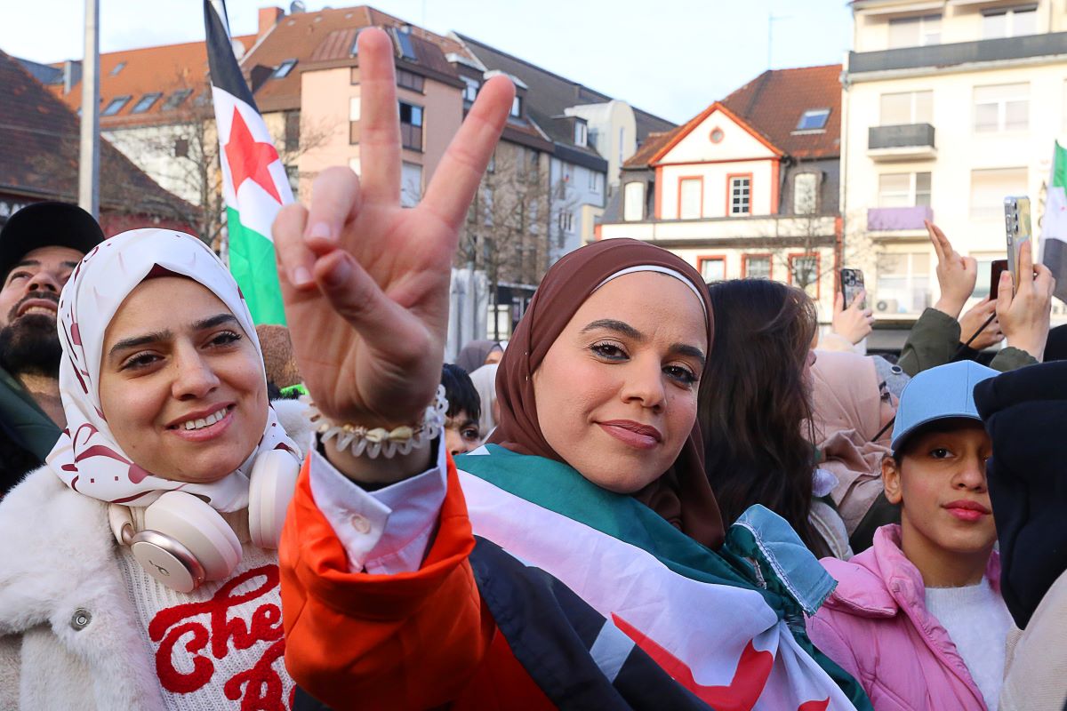 Syrians celebrate following the fall of former Syrian leader al-Assad in Mannheim