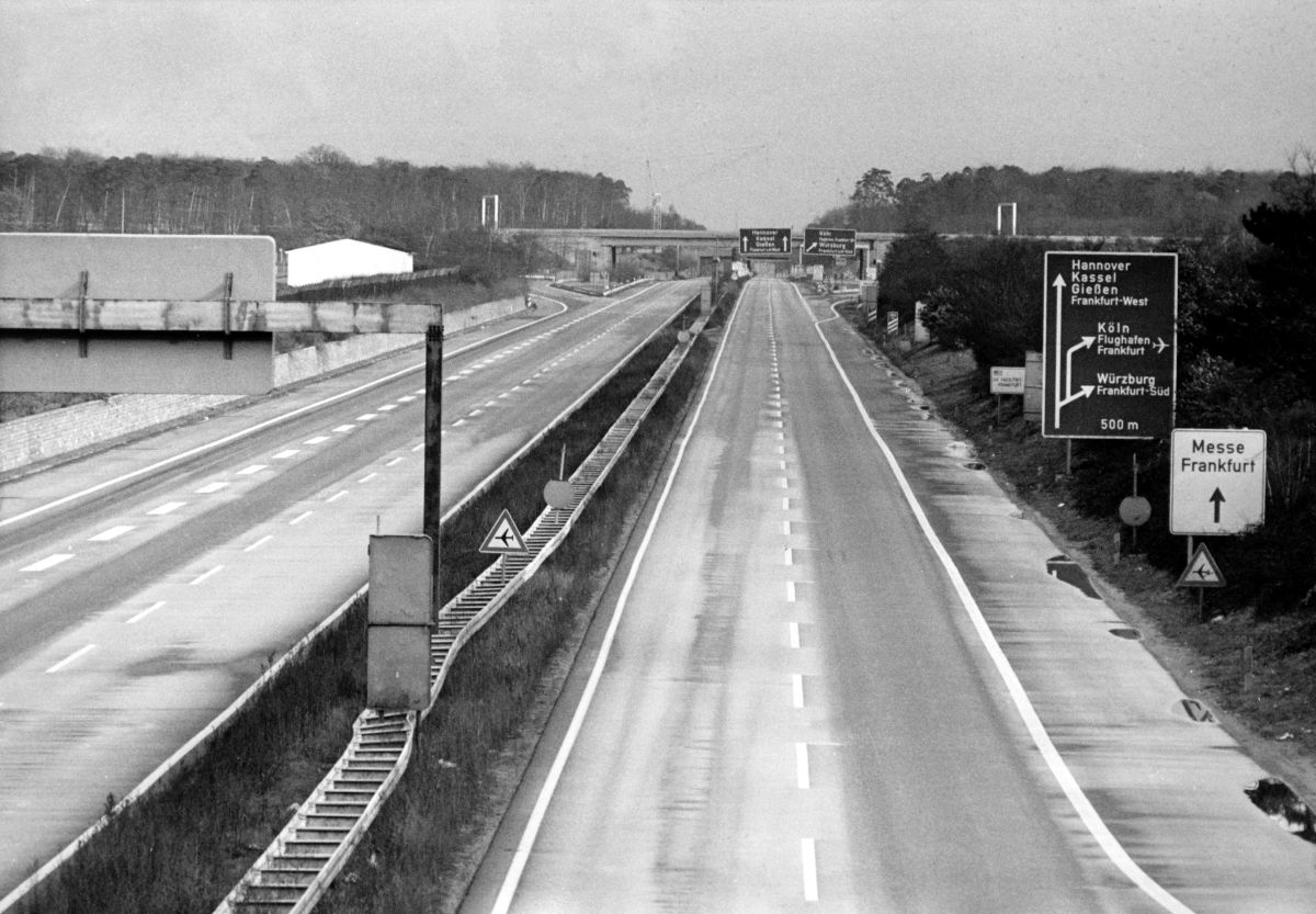 A black and white photo of an Autobahn without a car in sight.