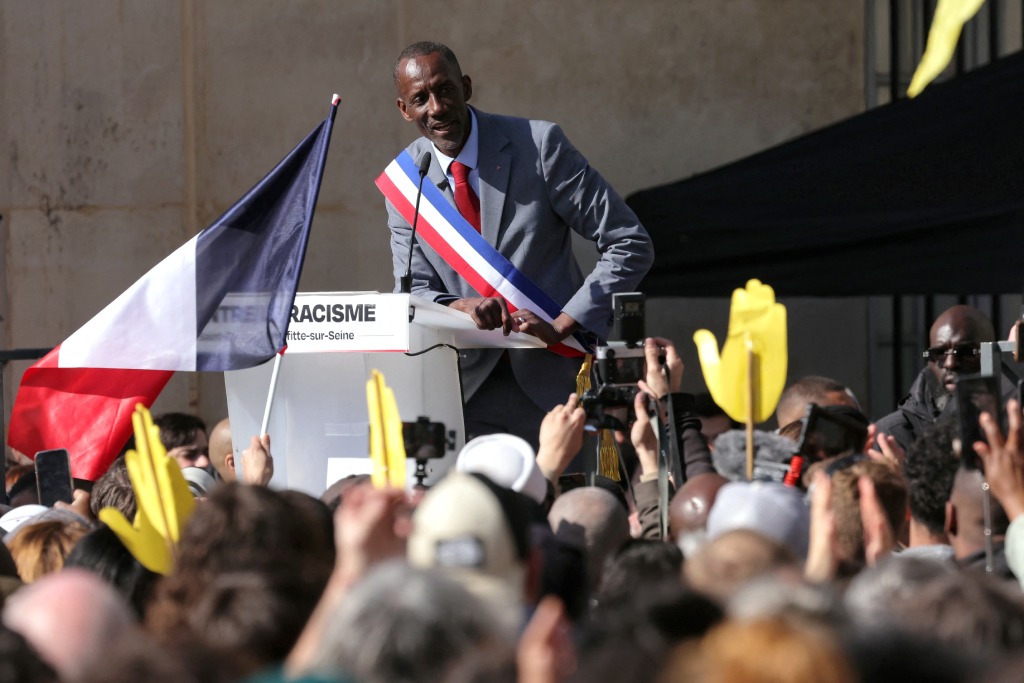 Saint-Denis Mayor Bally Bagayoko delivers a speech during a rally against racism.