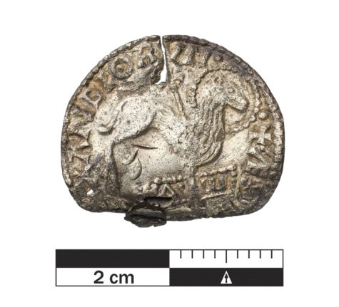The Lamb of God seen on one of the coins. 