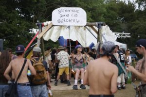 A reveller swings on a swing during a free party at a military site in Cornusse, near Bourges, central France, on May 2, 2026. 