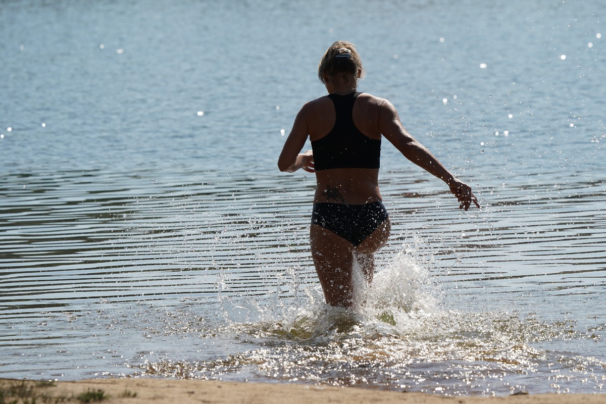 A swimmer runs into the pool area at Heidebad. 
