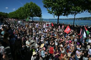 Demonstrators take part in a rally of a "No-G7" coalition of over 60 associations, unions and left-wing groups "against fascism and imperialism, a day ahead of the summit's start, in Geneva