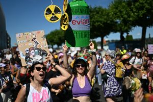 Demonstrators take part in a rally of a "No-G7" coalition