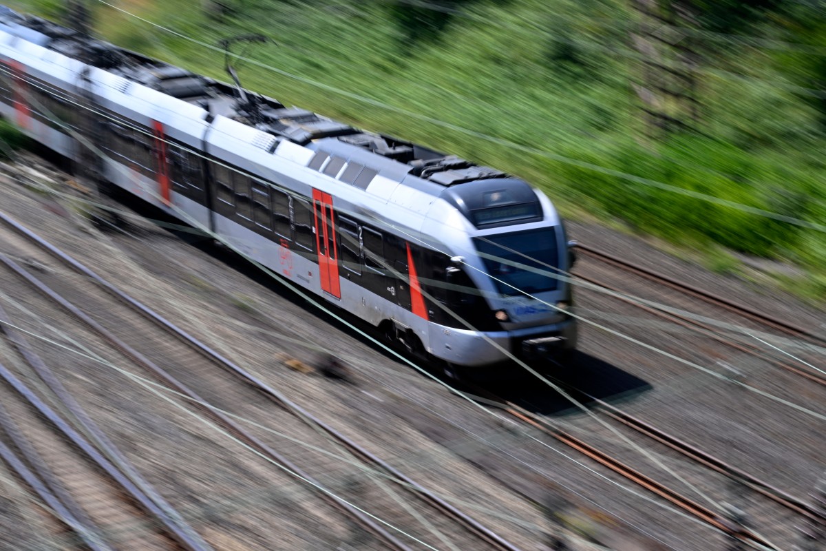 A regional train drives past the freight station in Hagen, western Germany o