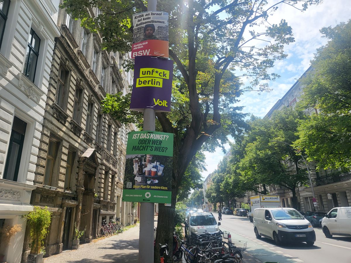 election posters on a lamppost in berlin