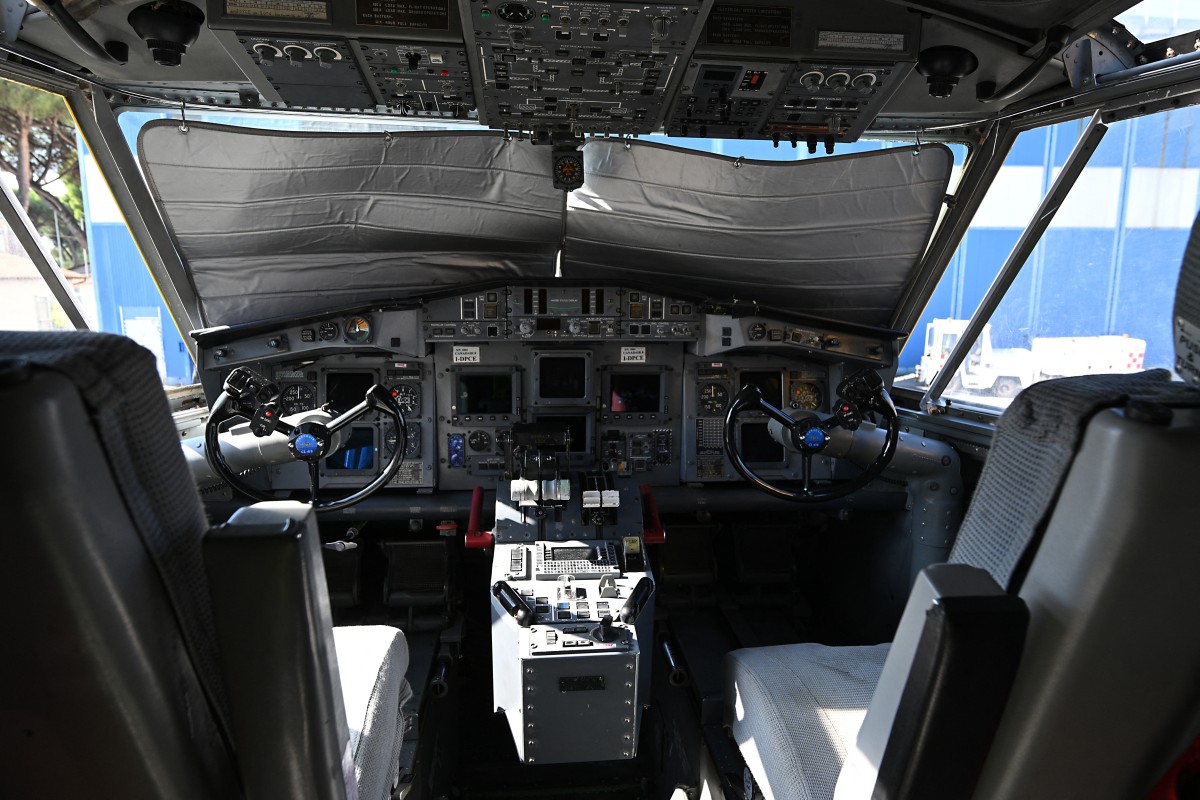 A picture shows the cockpit of a Canadair CL-415 water bomber
