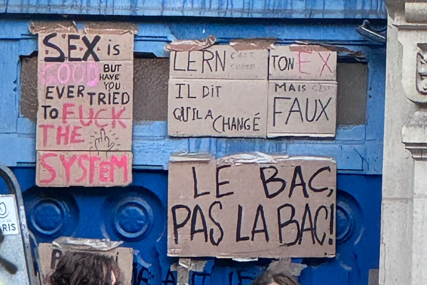 protest signs at a French high school